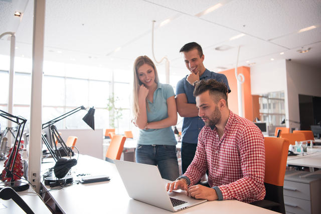 group of young employee workers with computer