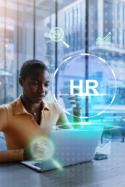 professional woman engaging in hr work with a laptop